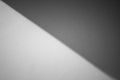 Abstract Black and White image of sunlight shading shadow on white concrete wall at outside of buildings.