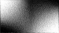 Abstract black and white noise dot grain gradient background texture Royalty Free Stock Photo