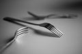 Abstract black and white still life with forks Royalty Free Stock Photo