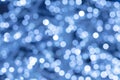 Abstract blue background with night lights, bokeh. Blurred backdrop, defocused shiny circles, texture. Illuminated celebration Royalty Free Stock Photo