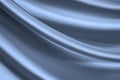 Abstract blue background. Silk satin fabric texture. Shiny, flowing fabric with wavy folds. Elegant background. Royalty Free Stock Photo