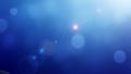 Abstract blue background with soft glowing bokeh light circles Royalty Free Stock Photo