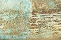 Abstract blue, beige and turquoise background wallpaper texture. Old flaky paint peeling off grungy cracked wall. Cracks, scrapes Royalty Free Stock Photo