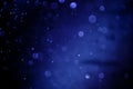 Abstract Blue bokeh defocus glitter blur background. Magic Background With Color Festive background with natural bokeh and bright Royalty Free Stock Photo