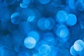 Abstract blue bokeh lights in blurry defocused style for captivating background imagery Royalty Free Stock Photo