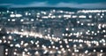 abstract blue circular bokeh background, city lights in the twilight with horizon, panorama Royalty Free Stock Photo