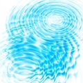 Abstract blue circular water ripples Royalty Free Stock Photo