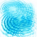 Abstract blue circular water ripples Royalty Free Stock Photo