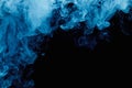 Abstract blue cloud pattern of white smoke on a black background. Royalty Free Stock Photo