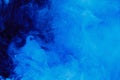 Abstract blue cloud pattern of white smoke on a black background. Royalty Free Stock Photo