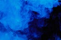 Abstract blue cloud pattern of white smoke on a black background. Royalty Free Stock Photo