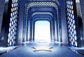 abstract blue corridor leading to shining door Royalty Free Stock Photo