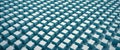 Abstract Blue Cubes in Repetitive Geometric Pattern