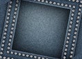Abstract blue denim with square frame with silver spangles Royalty Free Stock Photo