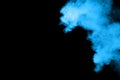 Abstract blue dust explosion on black background. Royalty Free Stock Photo