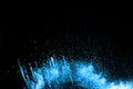 Abstract blue dust explosion on black background Royalty Free Stock Photo