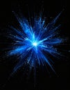 Abstract Blue Energy Burst Explosion with Bright Light Center on Black Background Royalty Free Stock Photo