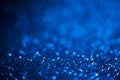 Abstract blue glitter background. Shiny glitter bokeh christmas background Royalty Free Stock Photo