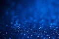 Abstract blue glitter background. Shiny glitter bokeh christmas background Royalty Free Stock Photo