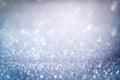 Abstract blue glitter bokeh background with shimmering light bubbles Royalty Free Stock Photo