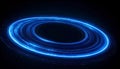 Abstract Blue Glowing Rings of Light and Particles on Black Background Royalty Free Stock Photo