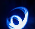 Abstract blue light on black background Royalty Free Stock Photo