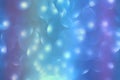 Abstract blue light bokeh background to create a festive atmosphere. Colorful background and texture with circles of light for art Royalty Free Stock Photo