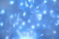 Abstract blue light bokeh background to create a festive atmosphere. Colorful background and texture with circles of light for art Royalty Free Stock Photo