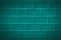 Abstract blue  neon brick wall vignette background . Blue duoton toned cement pavement Royalty Free Stock Photo