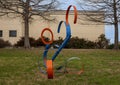 Abstract blue and orange steel sculpture outside the Biblical Museum of Art in Dallas, Texas.