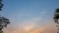 Abstract blue sky with beautiful wisp of cloud in sunset time, for use as a backing or backdrop Royalty Free Stock Photo