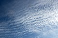 Abstract blue sky with spindrift clouds