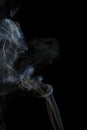 Abstract blue smoke from aromatic sticks. Royalty Free Stock Photo