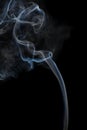 Abstract blue smoke from aromatic sticks. Royalty Free Stock Photo