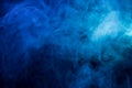 Abstract blue smoke on a dark background Royalty Free Stock Photo