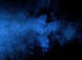 Abstract blue smoke on a dark background