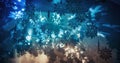 Abstract blue snowflakes stars shape Christmas background with gradient blue and yellow lights reflections Royalty Free Stock Photo