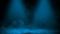 Abstract blue spotlight with smoke mist fog on a black background. Texture background for graphic and web Royalty Free Stock Photo
