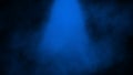 Abstract blue spotlight with smoke mist fog on a black background. Texture background for graphic web design Royalty Free Stock Photo