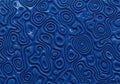 Abstract blue texture with layered, wavy patterns resembling a Royalty Free Stock Photo