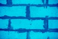 Blue toned brick wall