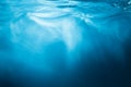 Abstract blue water background with sunbeams Royalty Free Stock Photo