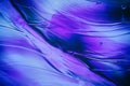 Abstract bluish purple swirling glass