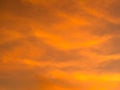 Abstract blur beautiful bright orange and golden sky at sunset sunrise for background Royalty Free Stock Photo
