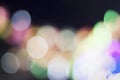 Abstract blur bokeh of light bulb glitter blue and yellow green blur black background Royalty Free Stock Photo