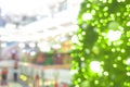 Abstract blur of Christmas tree in shopping mall for background Royalty Free Stock Photo