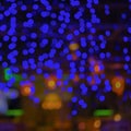 Abstract blur city rush or night club blue green yellow purple bokeh light background. Royalty Free Stock Photo