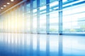 Abstract blur defocused background. Blurred open office space, airport hall, empty station hall with sun flare and Royalty Free Stock Photo