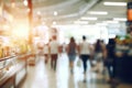 Abstract blur defocused background. People in grocery store, supermarket, shopping mall interior with product shelves Royalty Free Stock Photo