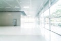 abstract blur and defocused in empty office building with glass